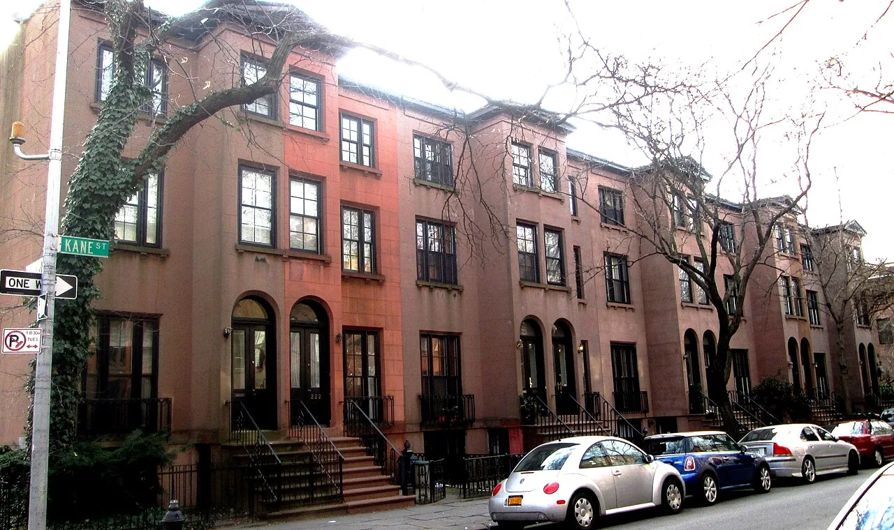 A row of brownstone homes on Kane Street in Brooklyn