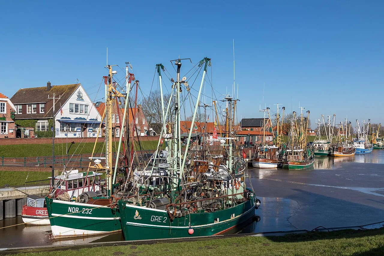 Fishing boats moored in the harbor at Greetsiel, Germany